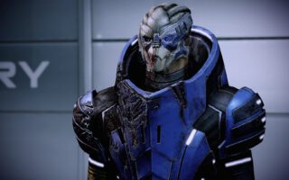 A turian in scarred blue armor with a targeting visor over one eye, standing in front of a grey wall.