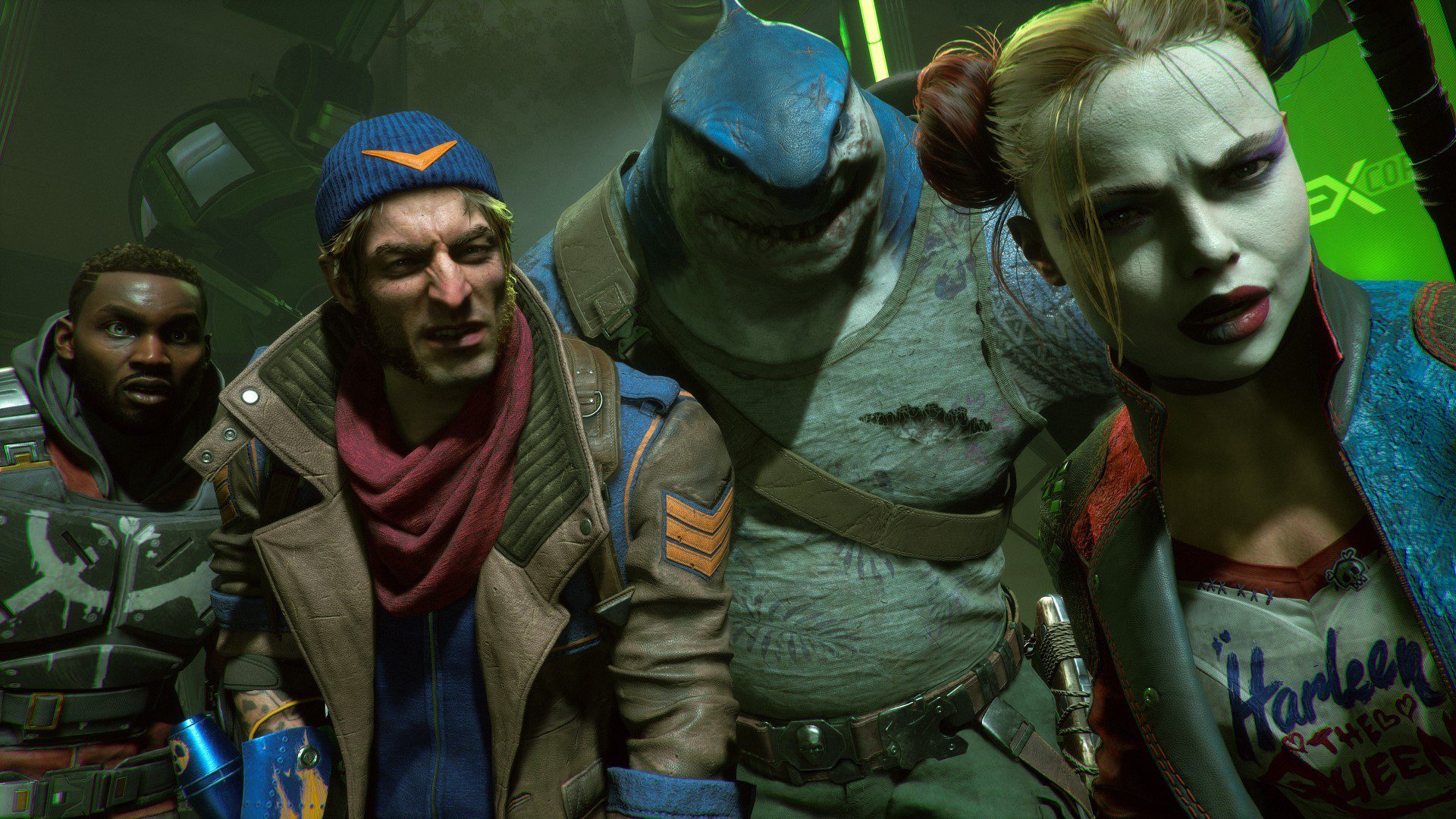 Deadshot, Captain Boomerang, King Shark and Harley Quinn crowd together and look down at the camera in Suicide Squad: Kill the Justice League